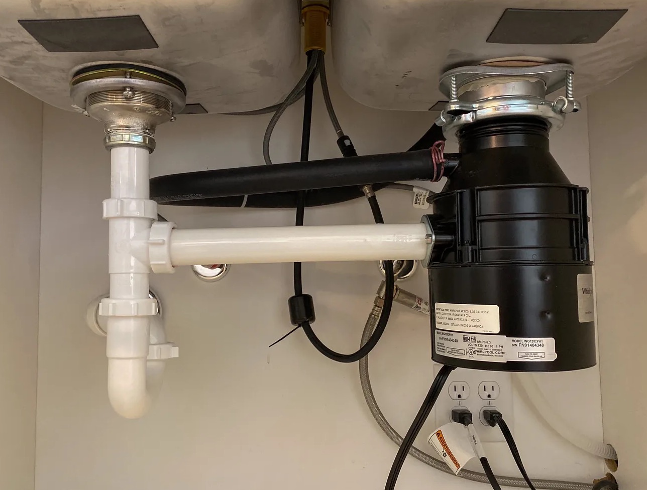 Leaky Garbage Disposal Cleanup in Roswell, GA